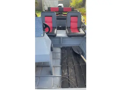 LOTE 000 - BARCO ALUMÍNIO 6 METROS CONJUNTO COM MOTOR EVINRUDE 35 HP E CARRETA PARANA REBOQUES