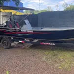 LOTE 000 - BARCO ALUMÍNIO 6 METROS CONJUNTO COM MOTOR EVINRUDE 35 HP E CARRETA PARANA REBOQUES